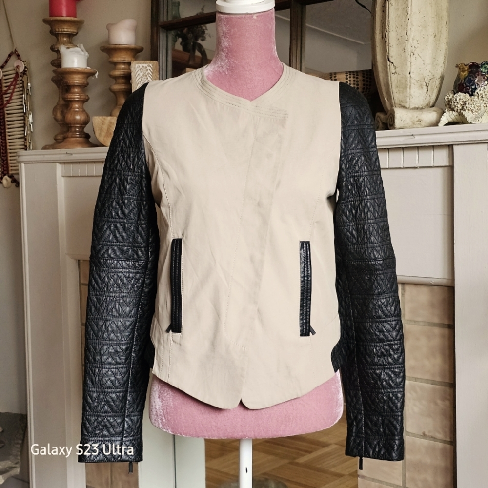 Danier leather jacket, size extra small.